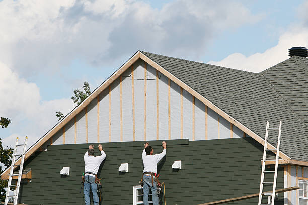 Professional Siding Replacement technician working in Riverdale, GA